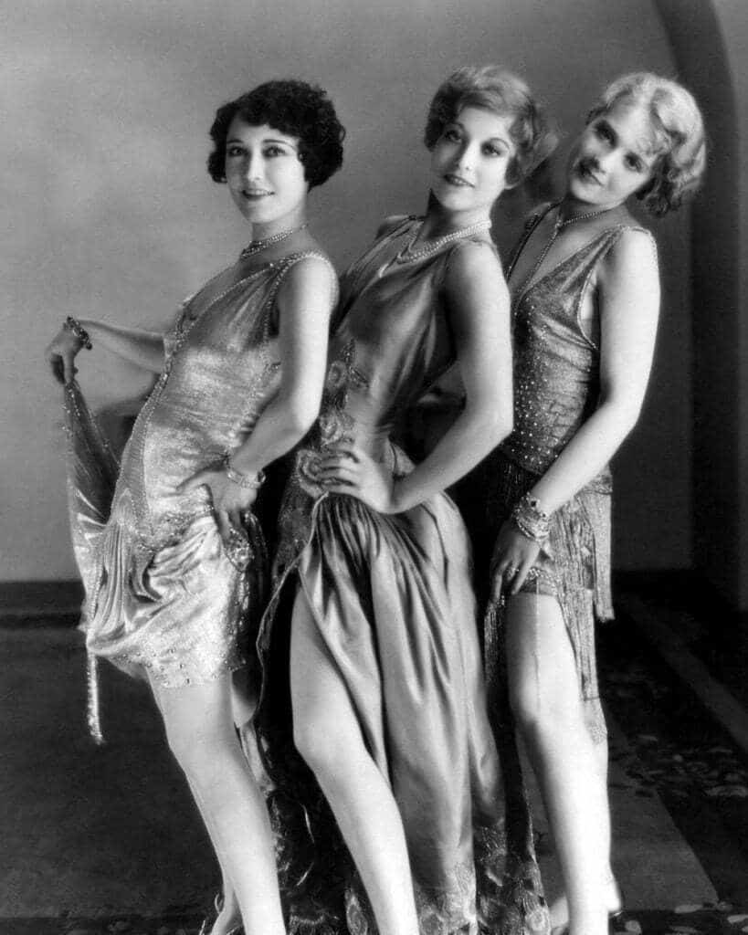 3 original 1920's flappers lined up for a model shoot