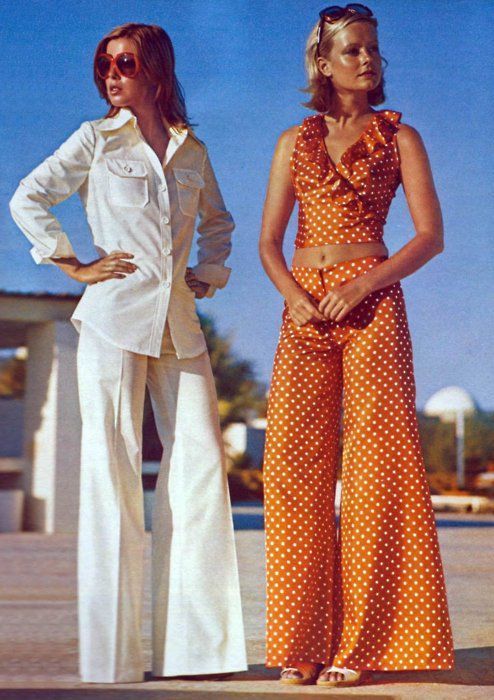 swinging 60's & 70's - two models in baggy pants suits and tight tops