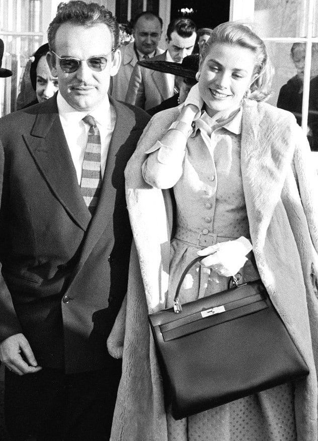 bags from the war era - grace kelly and prince rainier III holding a hermes birkin handbag