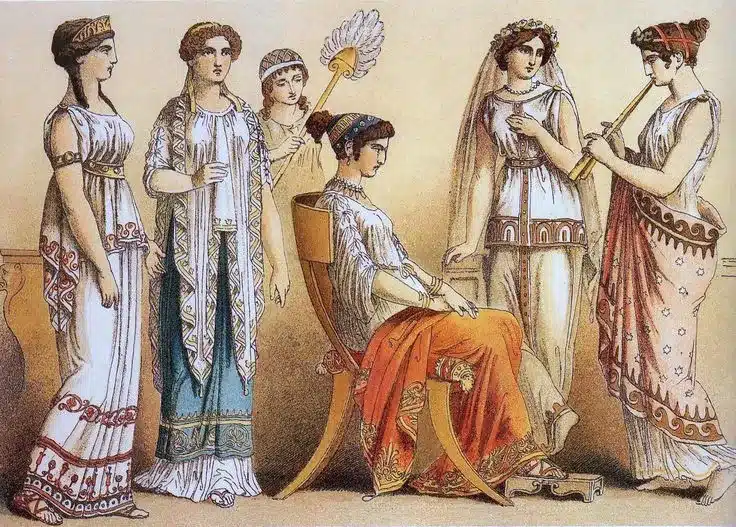 togas and tunics - a group of women wearing palla dresses with thick headpieces