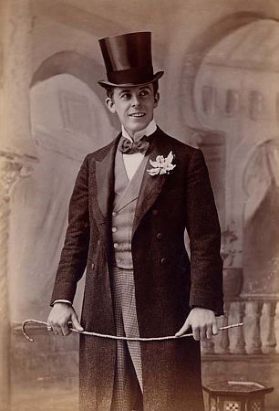 the edwardian gentleman - 1900's aristocrat in formal dress with top hat tails and cane