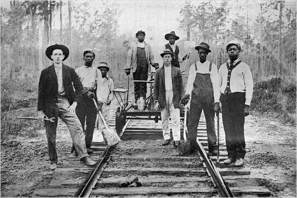 do vintage clothes maketh the gentleman - railroad working class men standing on the tracks 1911