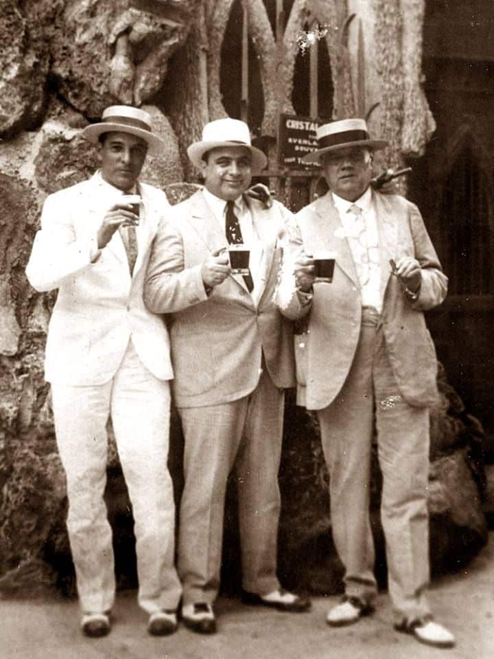 the gangster, roaring 20's - al capone with friends in cuba wearing wing tip oxford shoes