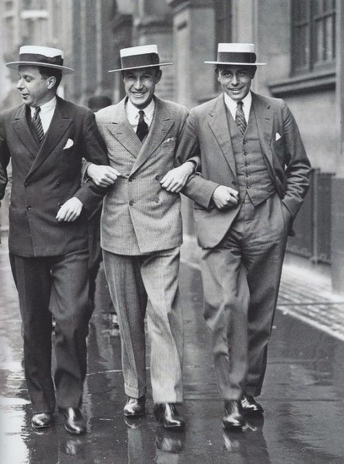 the gangster, roaring 20's - 3 men linking arms wearing double breasted suits and boater hats
