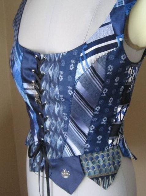 ethical considerations and sustainable practices in corsetry - corset made of upcycle old men's ties in various blue patterns