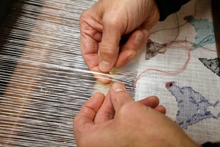 the beauty and appeal of vintage textiles - scott norris weaving woven inlay, working on a loom