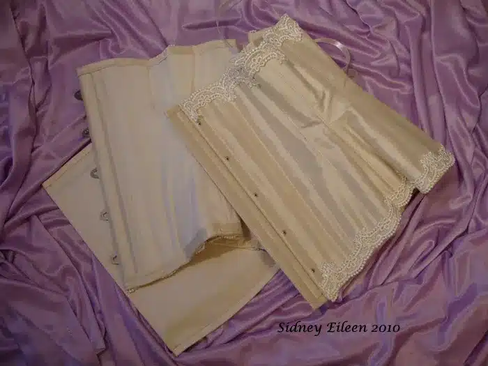 maintenance and care for vintage corsets - corset care by sidney eileen image of vintage corset on fabric