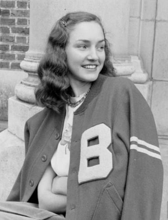 1940's/1950's era - woman in college style bomber jacket