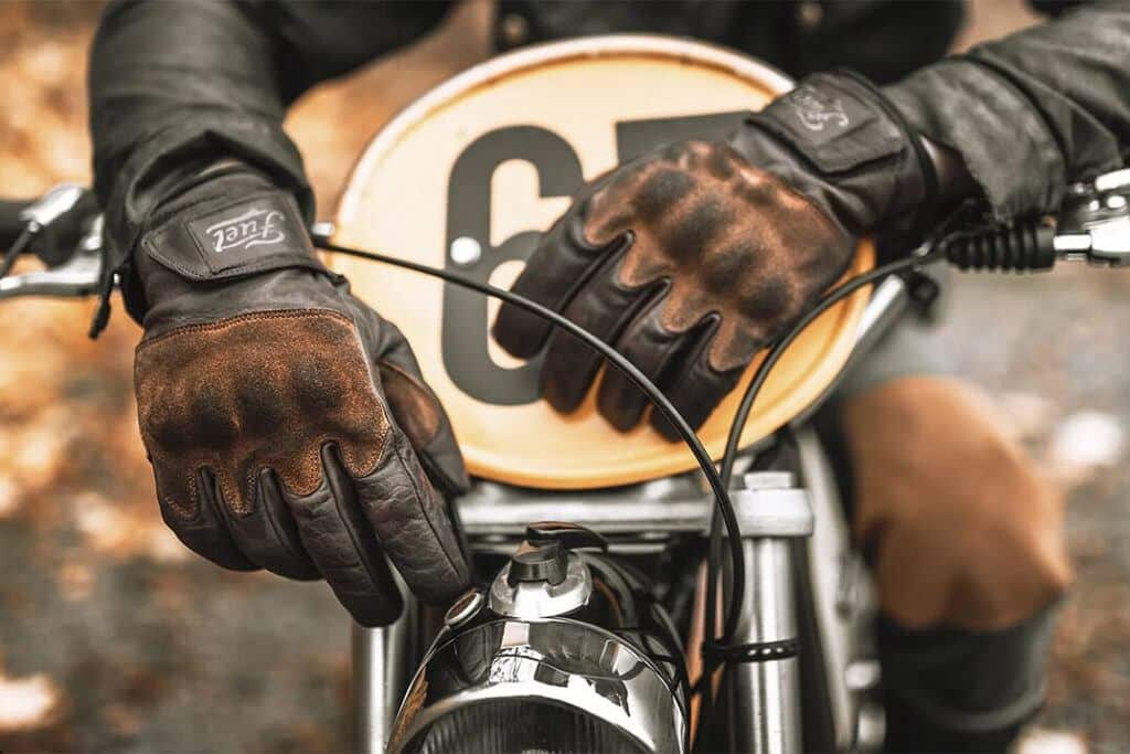 some other uses for gloves - a motor bike rider with his leather gloves