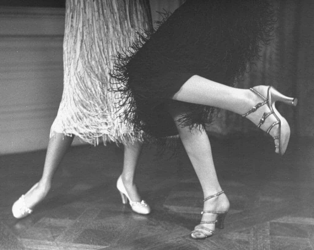 dancing feet of two women in charleston style