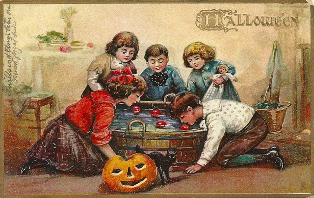 irish influence on halloween - children playing games of apple grabbing in early days