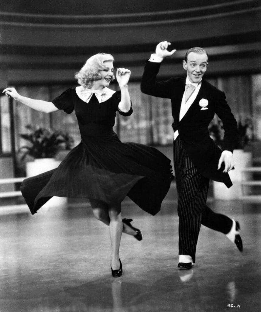 when the swing style really took off - ginger rogers and fred astaire dancing at a studio