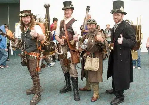 addressing inaccessibility - group of men wearing DIY steampunk attire, all looking like hunters and one dressed like a victorian gentleman