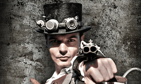 a man's steampunk gadget shooting from the wrist as an imaginary weapon