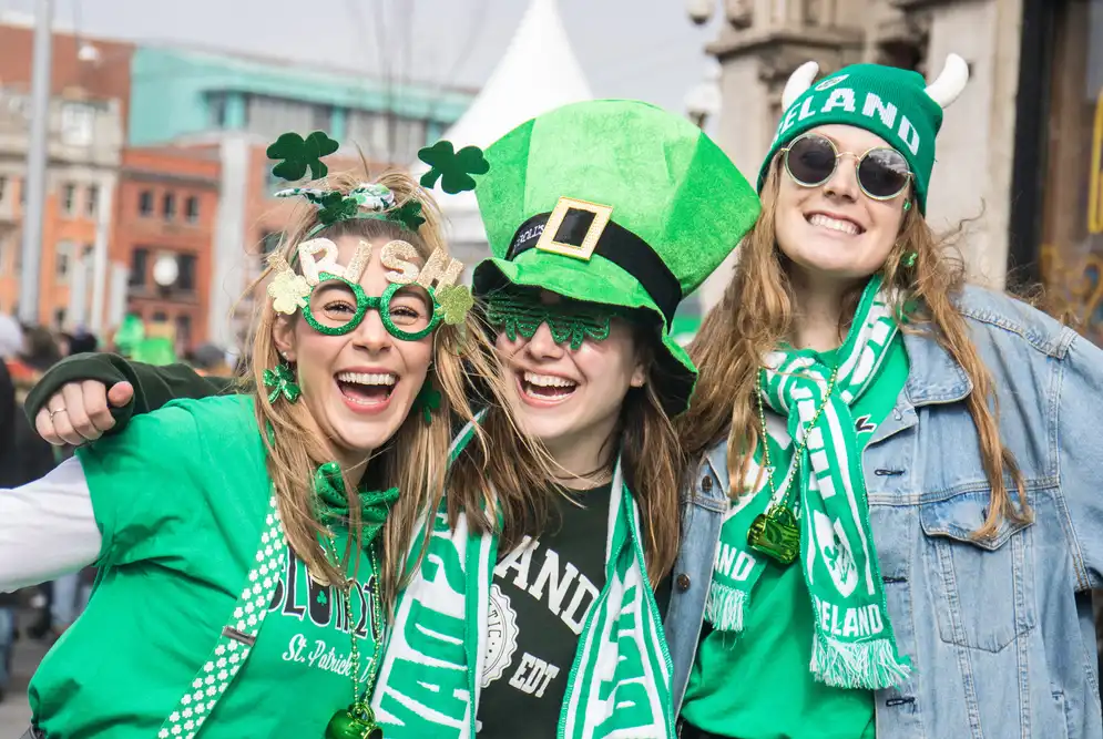 st. patricks day apparel and accessories - significance of wearing green, 3 ladies in casual st.pats day clothing with wild accessories