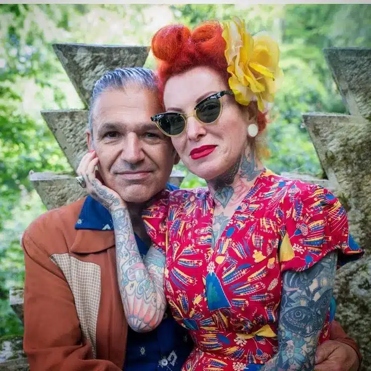 rockabilly in modern times, traditional tattoos - senior couple sporting rockabilly clothing, victory rolls and tattoos