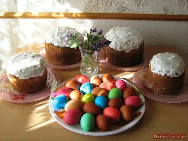 did the imperial family consume chocolate eggs or easter treats - russian easter festive table showcasing the kulich and coloured eggs