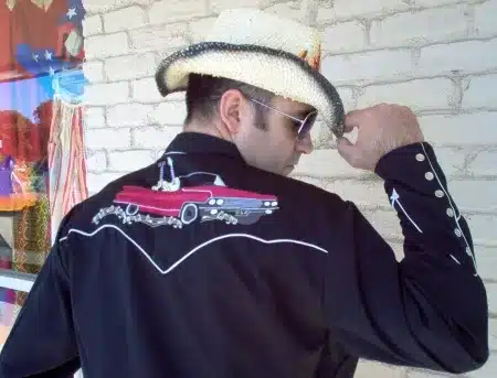 rockabilly in modern times, cowboy attire - cowboy dressed in 50's inspired dress shirt with motif and cowboy hat