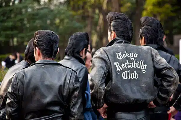 why rockabilly resonates,cultural revival and nostalgia - boys from the tokyo rockabilly club with quiff hairstyles