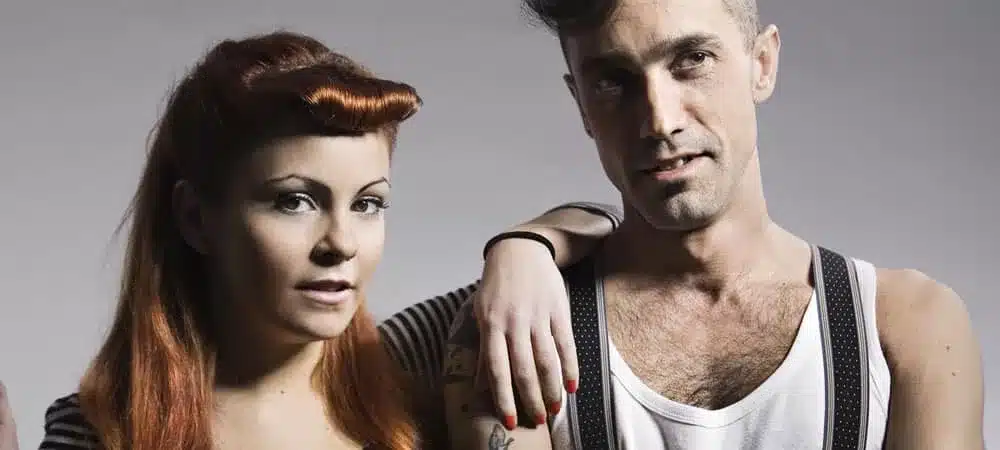 the rebel of rockabilly style - rockabilly man and woman in casual dance practice attire