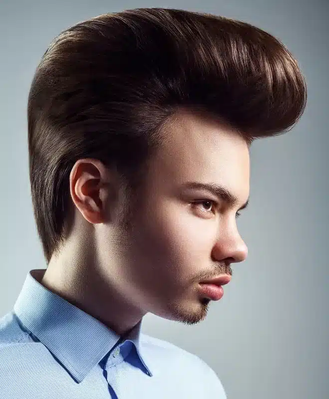 key elements of rockabilly fashion, pompadour hair - man with extreme pompadour hairstyle