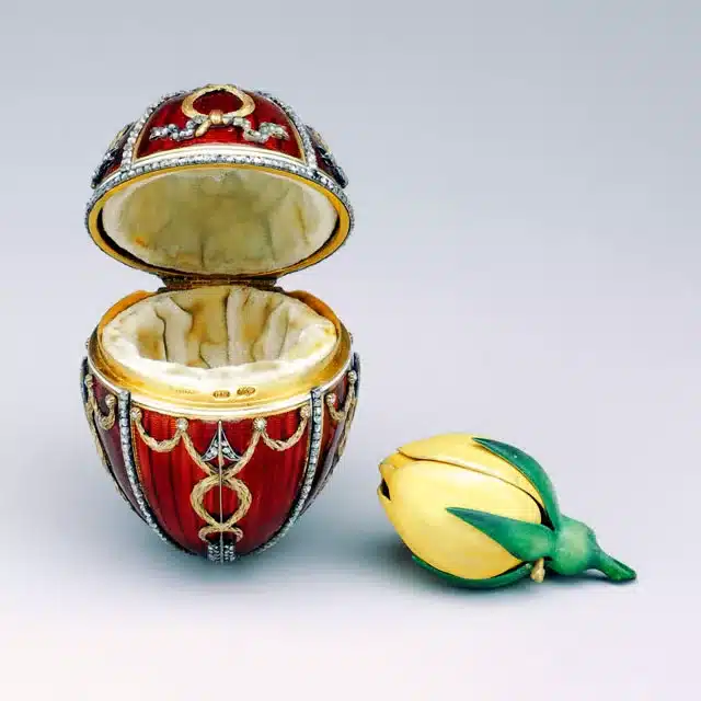 the significance of faberge eggs in the modern ear - rosebud egg circa 1895 depicting a ruby and diamond egg opening up with velvet lining and a rosebud outside the egg