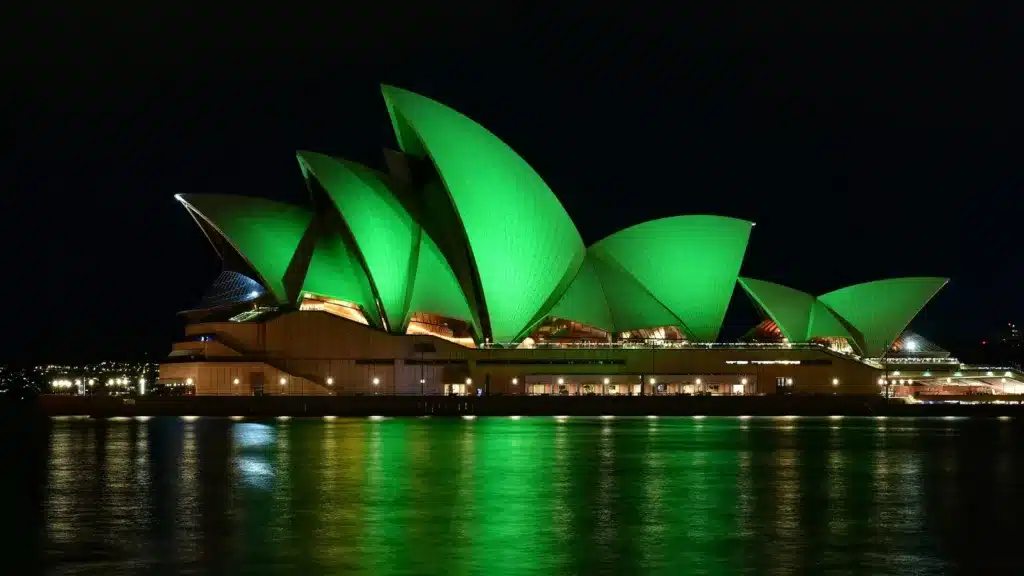 contemporary celebrations - sydney opera house lit up in green