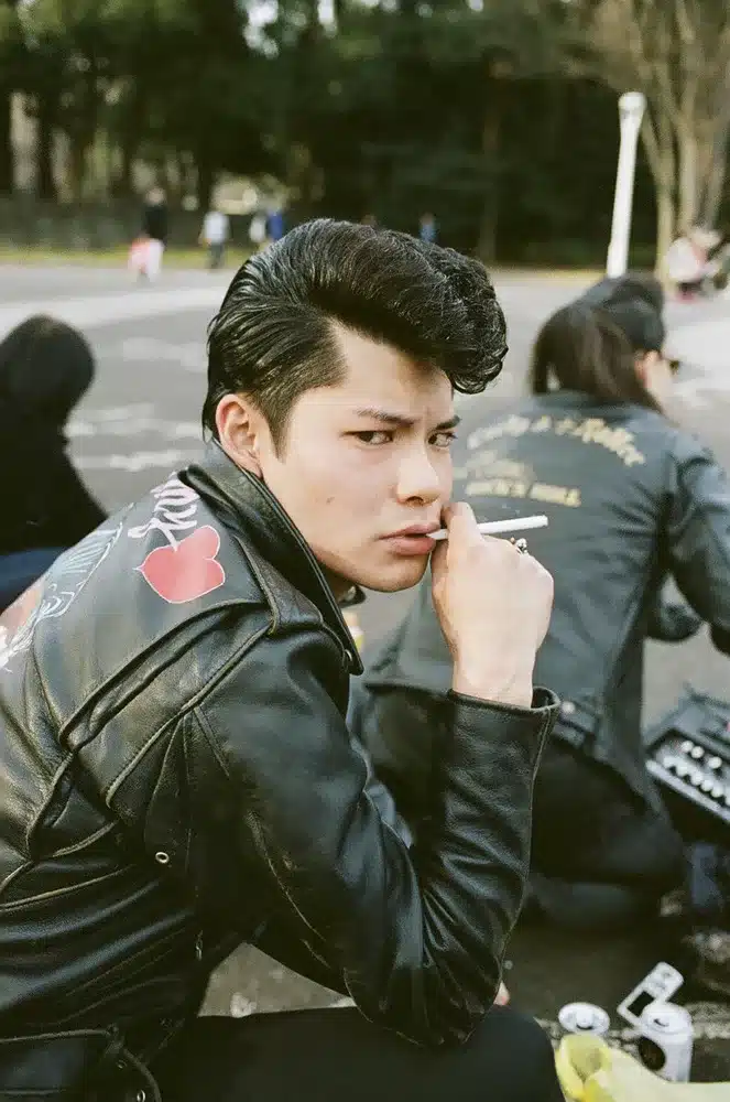 defining the rockabilly rebel, hairstyle - japanese rocker with quiff hairstyle, leathers and cigarette