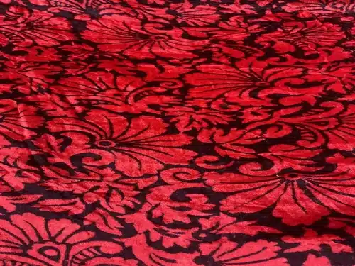 why velvet is synonymous with luxury and sophistication - red and black floral printed fabric