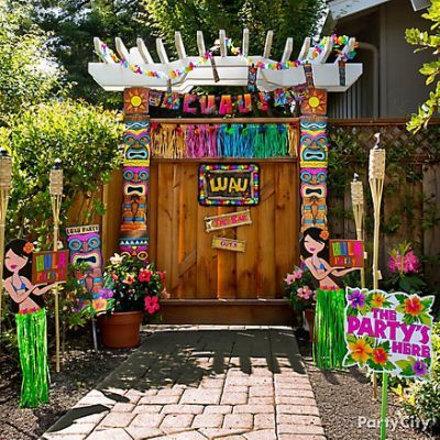 how themed parties became synonymous with celebrations - a luau party entrance outdoors decorated