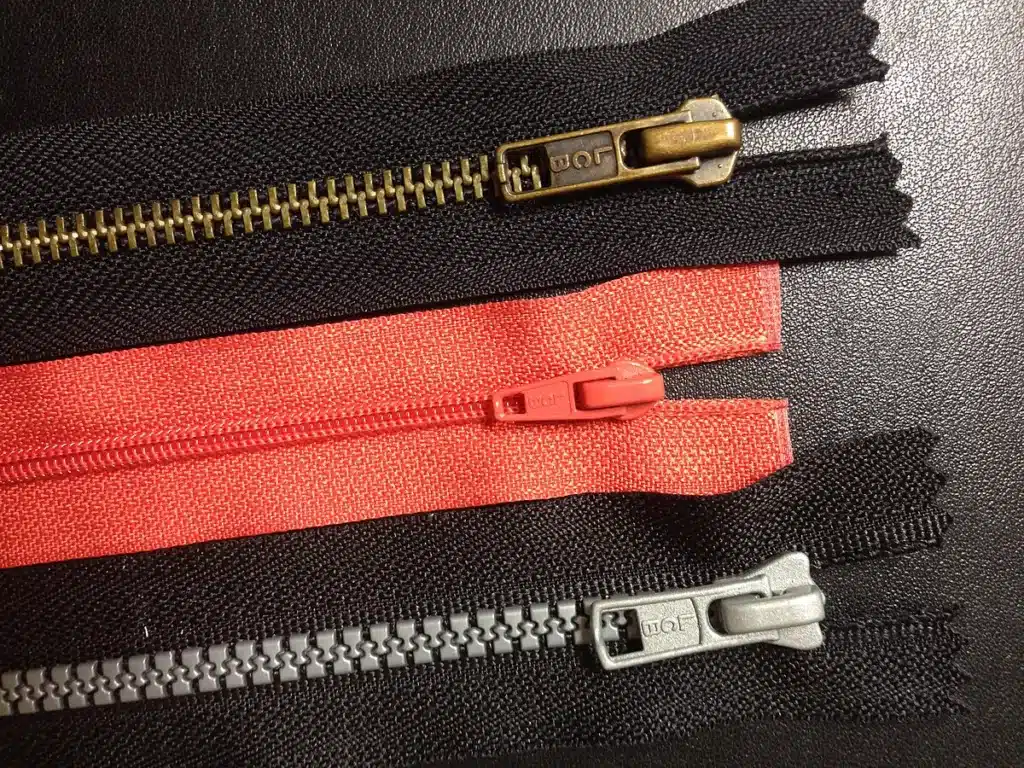 key vintage pieces-where to begin, 3 x zips showing different hardware used between vintage and modern