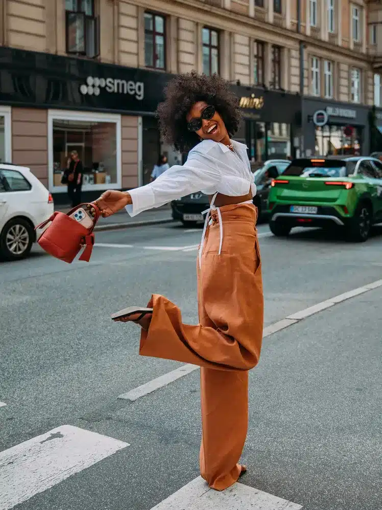 Lady on a street showing off her vintage aesthetic