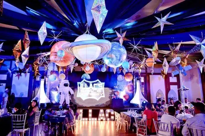 the fascinating world of themed parties, space odyssey - room decorated with space memorabilia, objects and suspended decorations