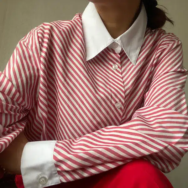 vintage workwear essentials - from practicality to empowerment, woman's striped shirt in red and white