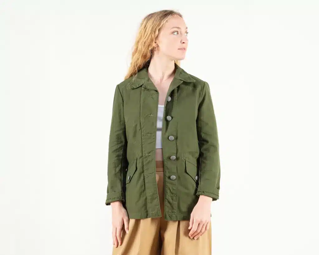 vintage work-wear essentials - from practicality to empowerment, woman in khaki utility jacket and fawn loose trousers