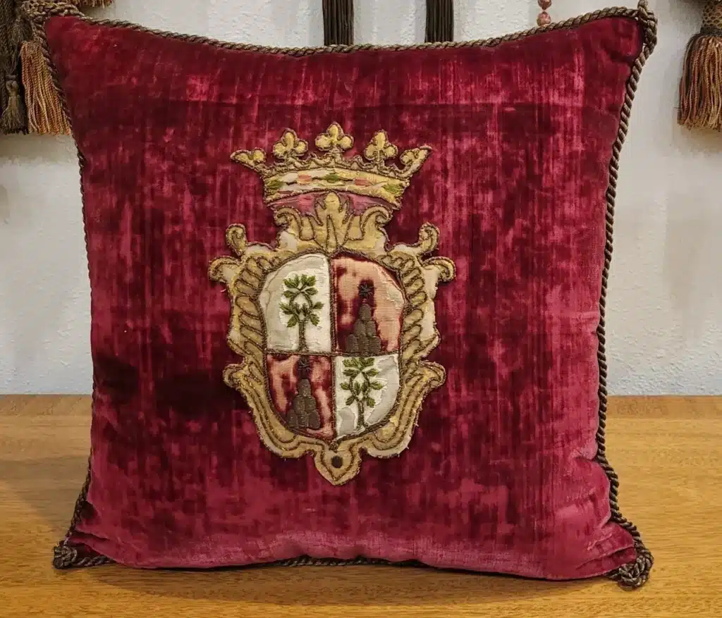 the historic allure of velvet in fashion - french antique ruby silk velvet cushion