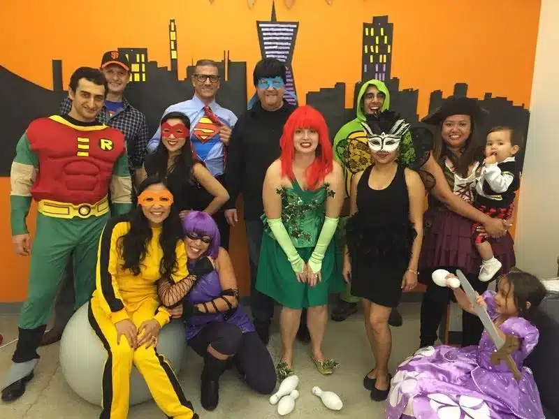 the fascinating world of themed parties, superheros and villains - group of people dressed in super hero costumes