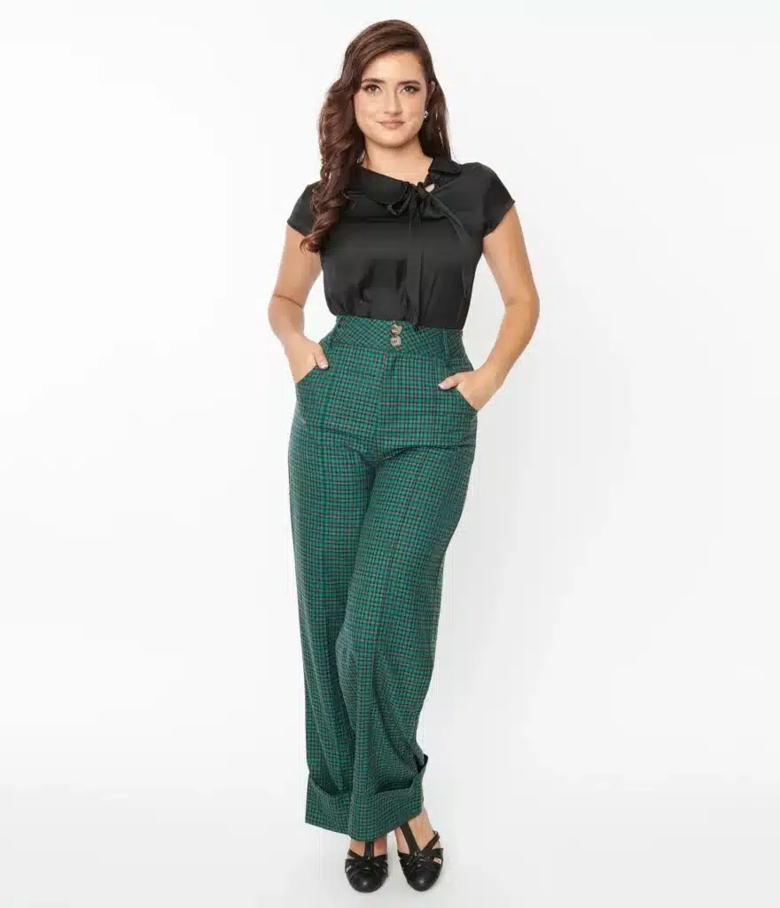 vintage work-wear essentials - from practicality to empowerment , woman in high waisted green plaid pants and crop sleeved black blouse