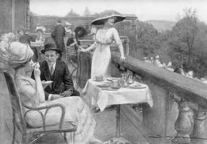 Edwardian ladies keeping cool on a balcony with other people drinking tea