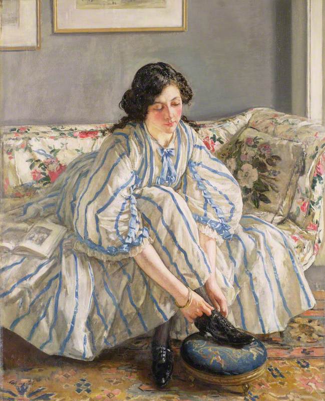 Edwardian woman reaching to tie up her shoe laces on a footstool