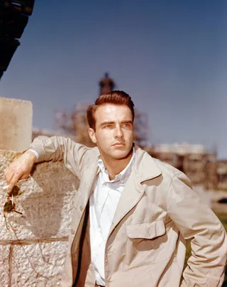 Montgomery Clift in a neutral safari style jacket and shirt.