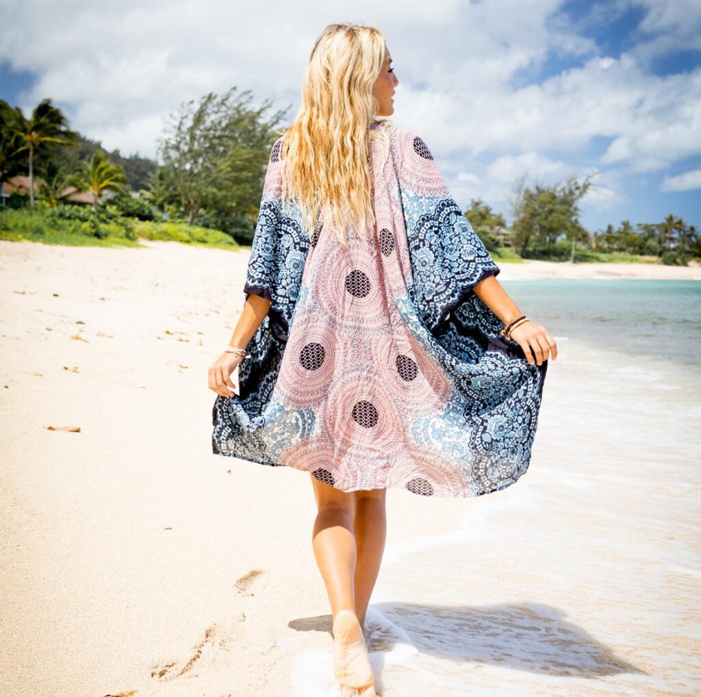 Blonde lady wearing multi coloured kimono wrap