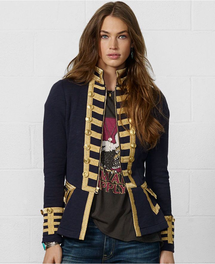 Model dressed in Ralph Lauren early military inspired blazer in black with gold stripes and studs