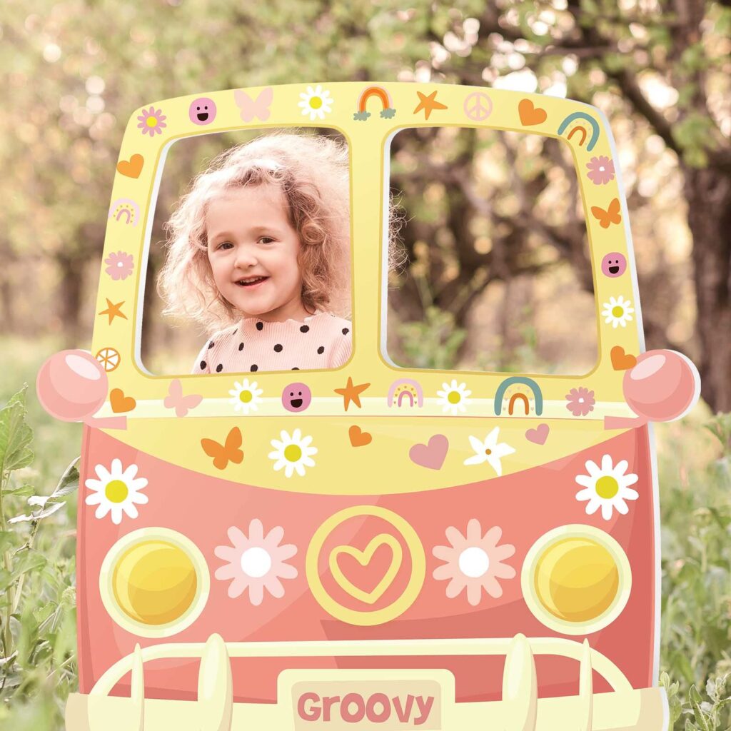 Little girl in a vintage kombi bus prop