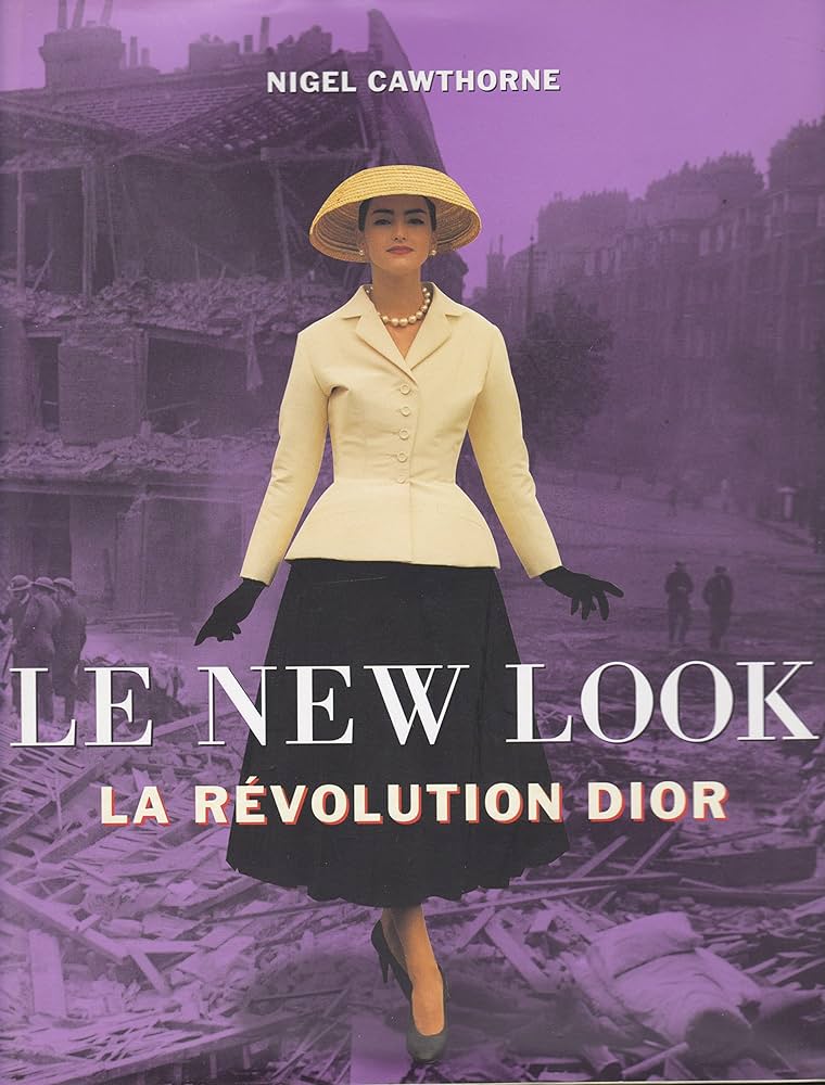 Magazine cover with Christian Dior model in a black skirt with a beige jacket and straw hat and matching accessories