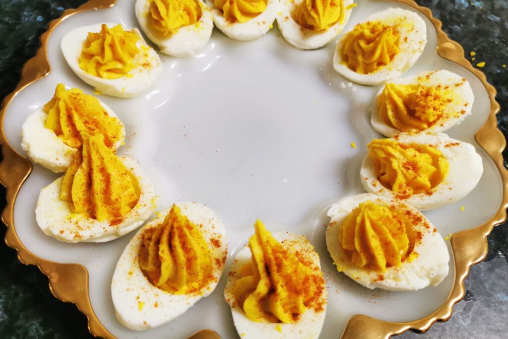 Classic devilled eggs on a serving plate