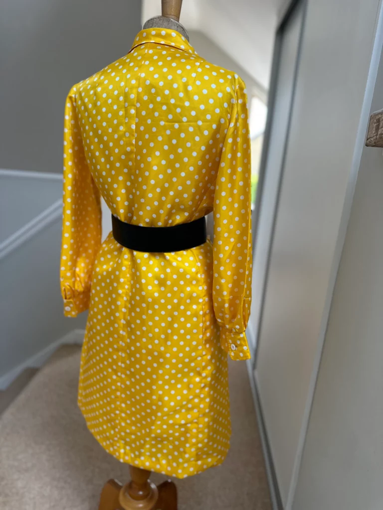 1980's satin shirt style belted dress with polka dots and long sleeves