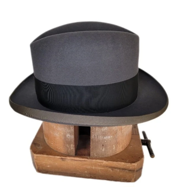 Men's grey and black band fedora hat on stand