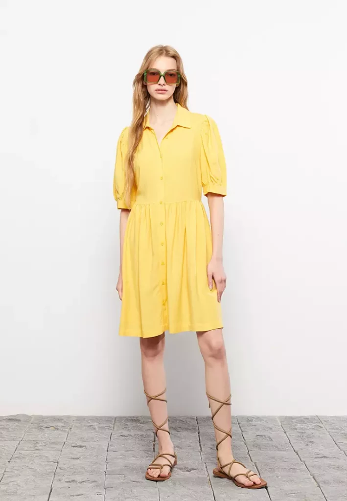 1990's short shirt dress with puff sleeves and button down front