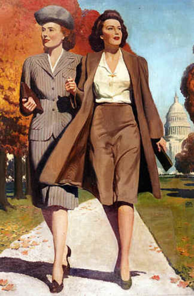 2 women in brown toned suits with neutral blouses and clutch bags